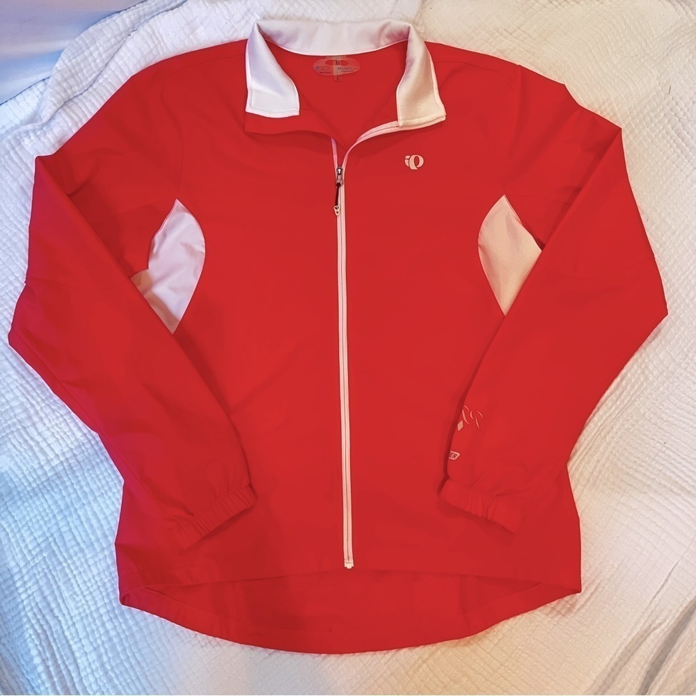 PEARL iZUMi women’s lightweight zip up jacket. Size large. Salmon color.